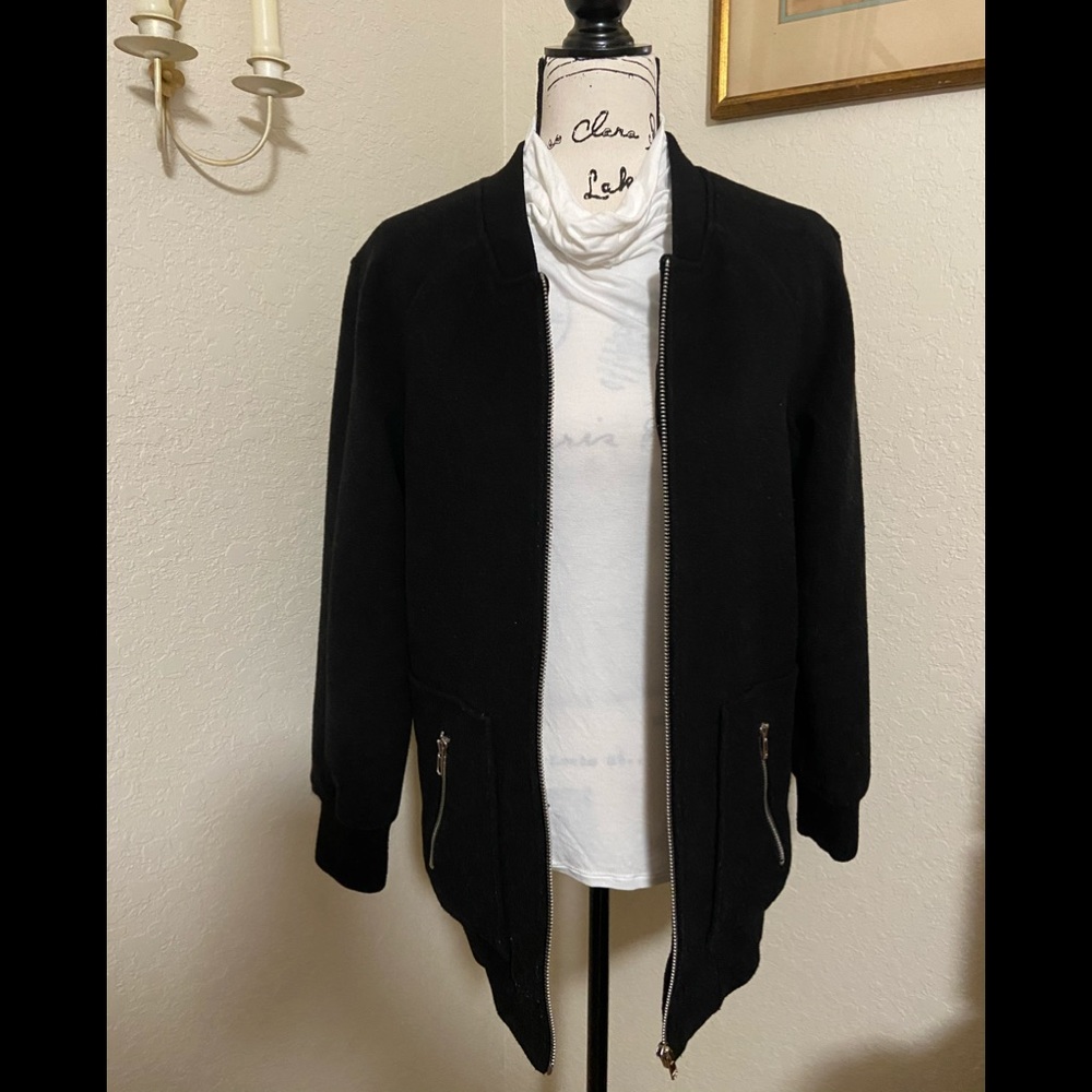 Black jacket/coat.